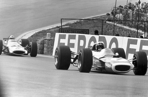 Spa-Francorchamps, Belgium. 9 June 1968: Jackie Stewart, Matra MS10-Ford, 4th position, leads Denny Hulme, McLaren M7A-Ford, retired, action