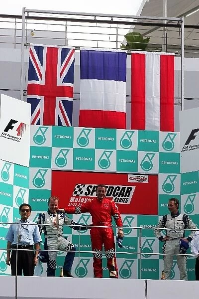 Speedcar Series: The podium: Johnny Herbert, second; Jean Alesi, race winner; Mathias Lauda, third