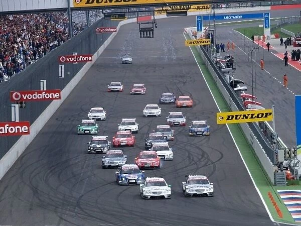 DTM. The start of the race. Pole sitter Jamie Green 