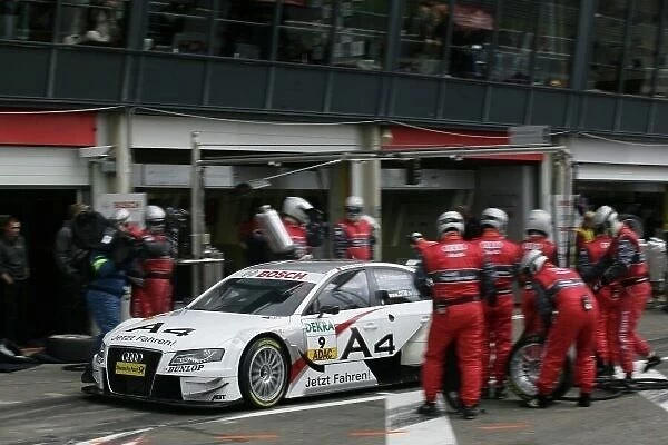 DTM. Tom Kristensen (DEN) Audi Sport Team Abt Audi A4 DTM (2008), makes a pit stop.