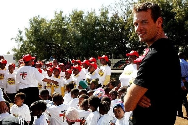 Unite Against Hunger: Alex Wurz McLaren Mercedes joins children at a school in Soweto which is being helped by Unite Againts Hunger