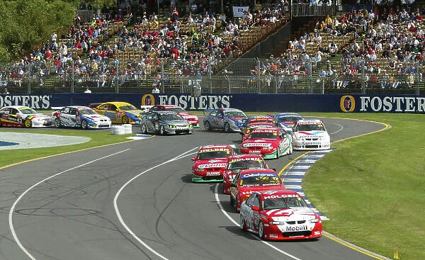 V8 Supercar 2002 AGP : Holden driver Jason Bright leads the field into the first corner during race one at the 2002 Fosters Australian GP Bright went on to win race one