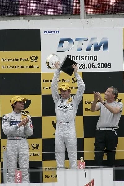 DTM. Winner Jamie Green (GBR) Junge Sterne AMG Mercedes C-Klasse (2008), on the podium.