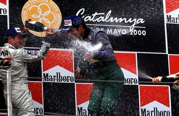 Winners spray champagne