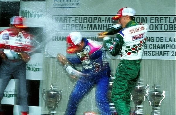 World Karting Championships: Race 1 podium: 1st Sauro Cesetti, centre. 2nd Marco Ardigo, left. 3rd Franck Perera, right