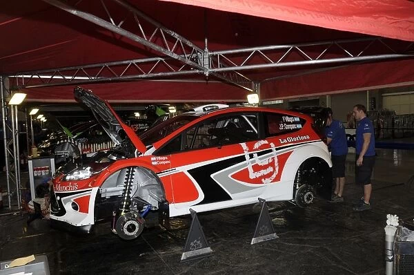 World Rally Championship: The Ford Fiesta RS WRC of Federico Villagra is prepared in the Poliforum service area