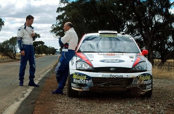 World Rally Championship: The Ford Focus RS WRC of Colin McRae  /  Derek Ringer after retiring with a broken radiator from nose diving after the
