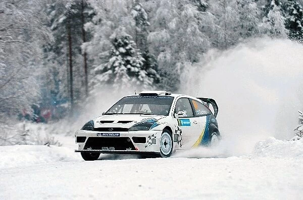 World Rally Championship: Janne Tuohino with co-driver Jukka Aho Ford Focus RS WRC on stage 7