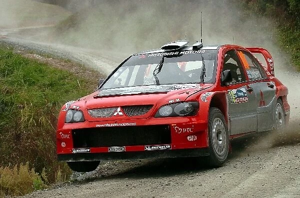 World Rally Championship: Kristian Sohlberg  /  Jakke Honkanen Mitsubishi Lancer WRC04