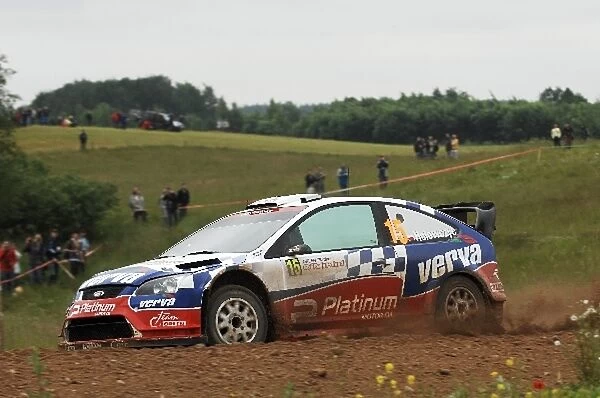 World Rally Championship: Krzysztof Holowczyc, Ford Focus WRC, on the shakedown stage