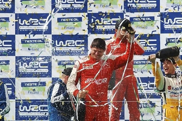 World Rally Championship: Martin Prokop the 2009 JWRC Champion is sprayed with champagne
