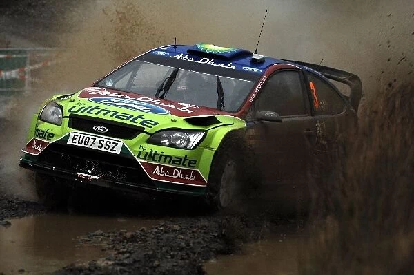 World Rally Championship: Mikko Hirvonen Ford Focus WRC loses control at the watersplash in Sweet Lamb, Stage 5