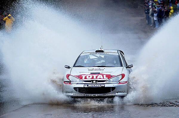 World Rally Championship, Rally of Argentina, May 16-19, 2002. Gilles Panizzi splashes through water on stage 11. Photo: Ralph Hardwick / LAT