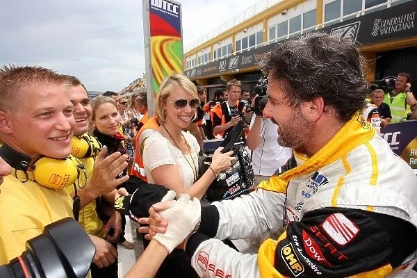 World Touring Car Championship: Race winner Yvan Muller celebrates victory in parc ferme