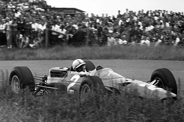 Zandvoort, Holland. 18 July 1965: John Surtees, Ferrari 1512, 7th position, action