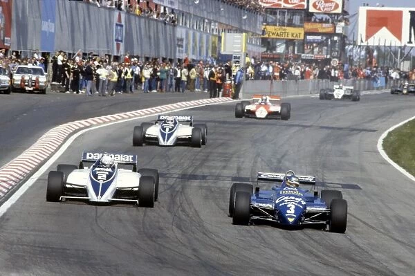 Zolder, Belgium. 9 May 1982: Michele Alboreto, Tyrrell 011-Ford, retired, leads Riccardo Patrese, Brabham BT50-BMW, retired, Nelson Piquet, Brabham BT50-BMW