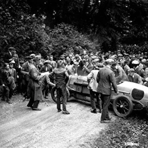1924 Surbiton Club Hillclimb. Spectators attempt to clear a spun competitor
