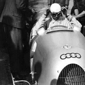 1936 Eifelrennen. Nurburgring, Germany. 14 June 1936. Achille Varzi, Auto Union C, 7th position, portrait, helmet. World Copyright: Robert Fellowes / LAT Photographic Ref: 36EIF03