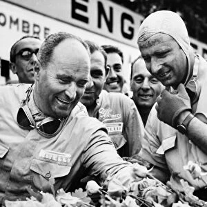 1950 Belgian Grand Prix - Podium: Juan Manuel Fangio and Luigi Fagioli after finishing in 1st and 2nd positions respectively