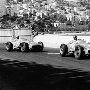 1955 Monaco Grand Prix, Monte Carlo Juan Manuel Fangio leads Stirling Moss