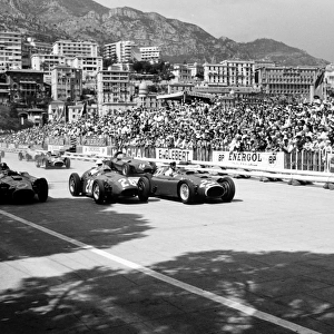 1956 Monaco Grand Prix - Start: Juan Manuel Fangio, Lancia-Ferrari D50, 4th position, Stirling Moss, Maserati 250F, 1st position, and Eugenio Castellotti