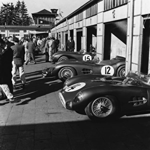 1957 Nurburgring 1000 kms: The Tony Brooks / Noel Cunningham-Reid, 1st position in the garages along side the Roy Salvadori / Les Leston, 6th position
