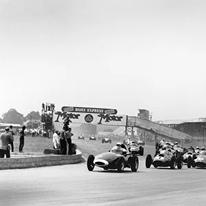 1958 British Grand Prix: Stirling Moss, retired, action