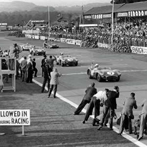 1958 RAC Tourist Trophy: Stirling Moss / Tony Brooks, 1st position, leads Jack Brabham / Roy Salvadori, 2nd position, across the finish line, action