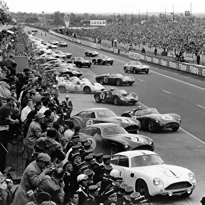 1961 Le Mans 24 hours - Start: The cars and drivers make the traditional LeMans start behind Jean Kerguen / Jacques Dewez. Roy Salvadori / Tony Maggs