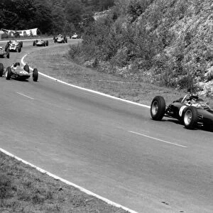 1962_45: Graham Hill leads Jim Clark, John Surtees, Bruce McLaren and the field