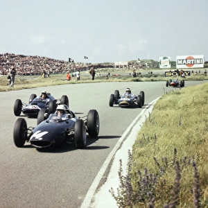 1963 Dutch Grand Prix: Richie Ginther leads Jo Bonnier and Dan Gurney. Gurney finished in 2nd position