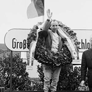 1964 German Grand Prix: John Surtees celebrates 1st position on the podium