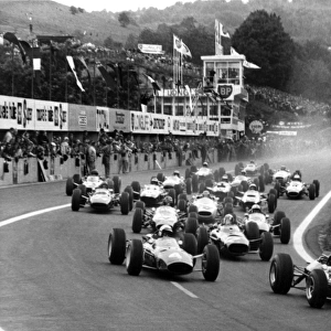1965 French Grand Prix - Start: Jim Clark, 1st position, leads the field away at the start of the 40 lap race, action