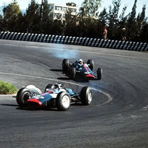 1965 Mexican Grand Prix: Bob Bondurant leads Dickie Attwood. Attwood finished in 6th position