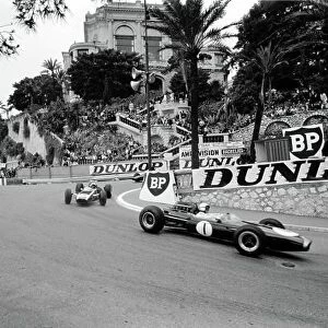 1965 Monaco Grand Prix. Monte Carlo, Monaco. 28-30 May 1965. Jack Brabham, Brabham BT11, retired, leads Bruce McLaren, Cooper T77, 5th position, action. World Copyright - LAT Photographic Ref: L65/219/7A