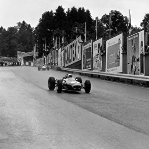 1966 Belgian Grand Prix: Jack Brabham, Brabham BT19-Repco, 4th position, leads Lorenzo Bandini, Ferrari 158 / 246, 3rd position, action