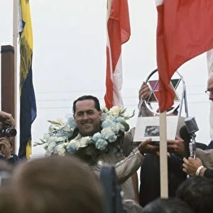 1967 Canadian Grand Prix - Jack Brabham: Jack Brabham celebrates victory on the podium