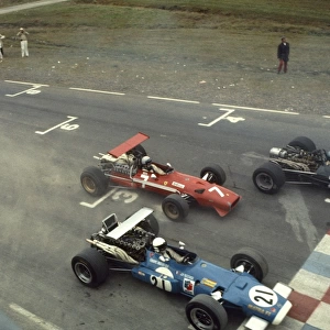 1968 United States Grand Prix - Start: Jean-Pierre Beltoise, retired, leads Derek Bell, retired, Piers Courage, retired, and right at the back