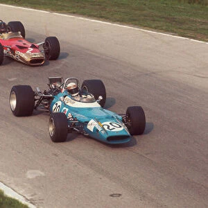 1969 Italian Grand Prix. Monza, Italy. 5-7 September 1969. Jackie Stewart (Matra MS80 Ford) 1st position, followed by Graham Hill (Lotus 49B Ford). Ref-69 ITA 07. World Copyright - LAT Photographic
