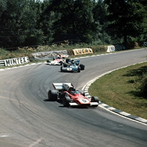 1972 British Grand Prix: Jacky Ickx leads Jackie Stewart and Jean-Pierre Beltoise. Stewart finished in 2nd position. Ref-3 / 5100I