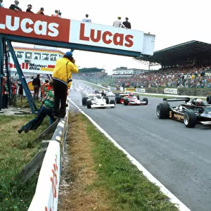 1978 British Grand Prix. Brands Hatch, England. 14-16 July 1978. Mario Andretti and Ronnie Peterson (both Lotus 79 Ford's) lead the field away at the start. Ref-78 GB 12. World Copyright - LAT Photographic