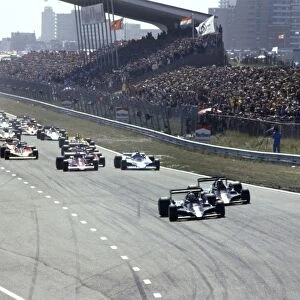 1978 Dutch Grand Prix - Start: Mario Andretti, 1st position, leads Ronnie Peterson, 2nd position, at the start, action