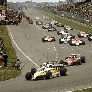 1982 Dutch Grand Prix: Alain Prost and Rene Arnoux, lead Didier Pironi and Patrick Tambay into Tarzan at the start