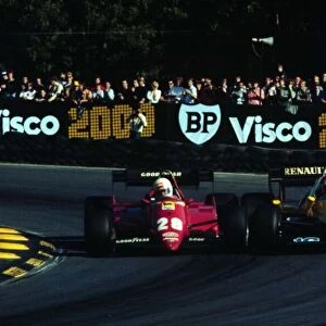 1983 European GP. Rene Arnoux and Eddie Cheever fight for position around Druids Bend at Brands Hatch. Photo: LAT