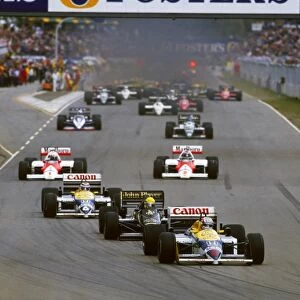 1986 Australian Grand Prix - Nigel Mansell: Nigel Mansell, retired, leads the field on the warm up lap. Action