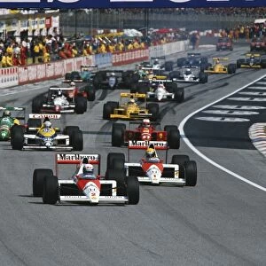 1989 San Marino Grand Prix: Alain Prost leads Ayrton Senna and Riccardo Patrese, Nigel Mansell and Alessandro Nannini at the start
