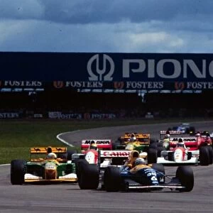 1992 BRITISH GP. Ricardo Patrese leads the following pack at Silverstone letting his