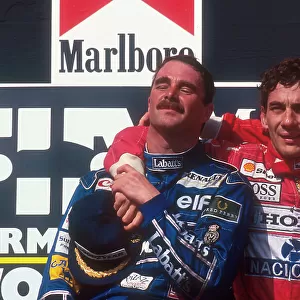 1992 Hungarian Grand Prix. Hungaroring, Hungary. 14-16 August 1992. Nigel Mansell (Williams Renault) celebrates 2nd position on the podium and winning the drivers World Championship