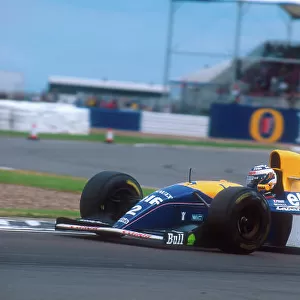 1993 British Grand Prix. Silverstone, England. 9-11 July 1993. Alain Prost (Williams FW15C Renault) 1st position. Ref-93 GB 06. World Copyright - LAT Photographic