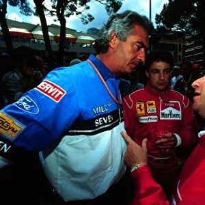 1994 MONACO GP. Ferrari and Benetton Chiefs Flavio Briatore and Jean Todt